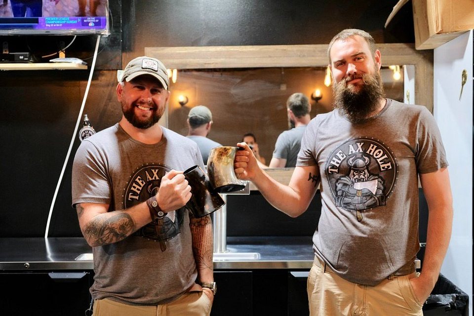Guests toasting at Bearded Social House